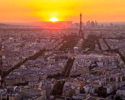Eiffel Tower lit by sunset