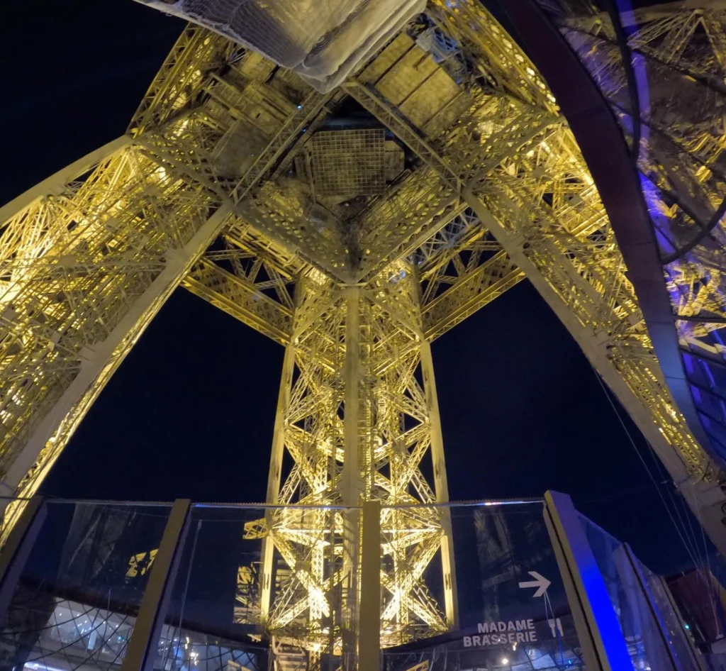 Sign for Madame Brasserie under the Eiffel Tower