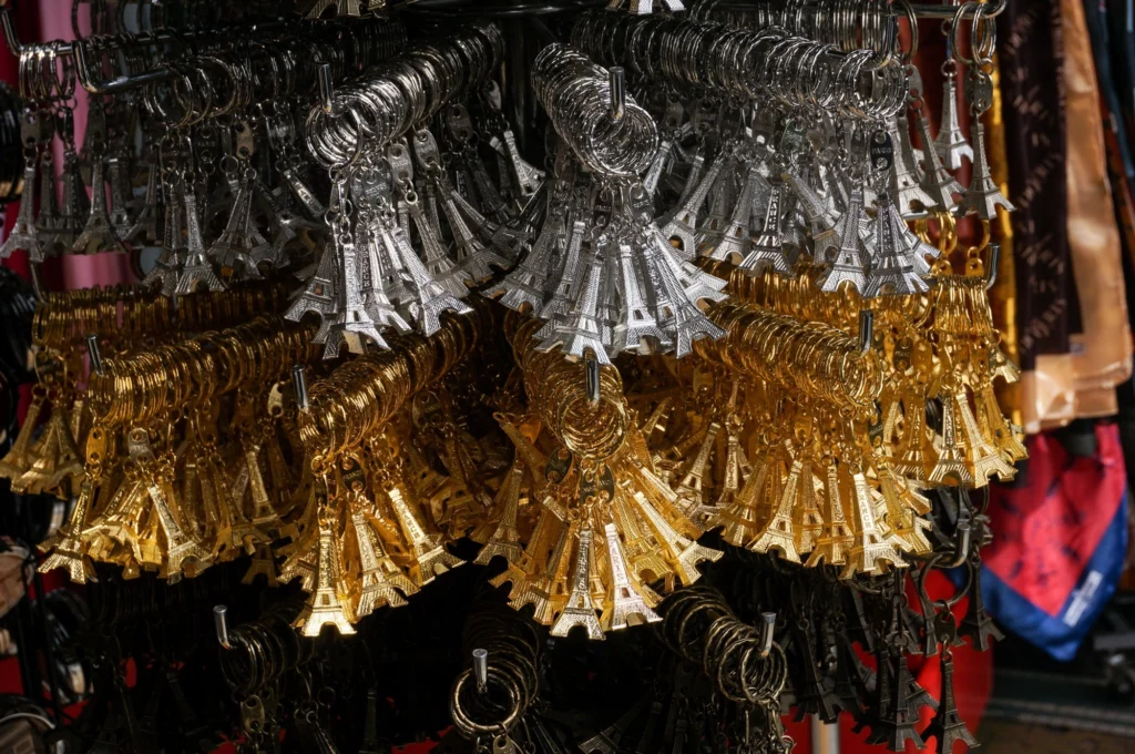 Stack of gold and silver Eiffel Tower keychains